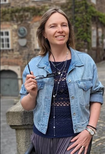 Asya Zaslavska, wearing one of her own crochet tops under a denim jacket