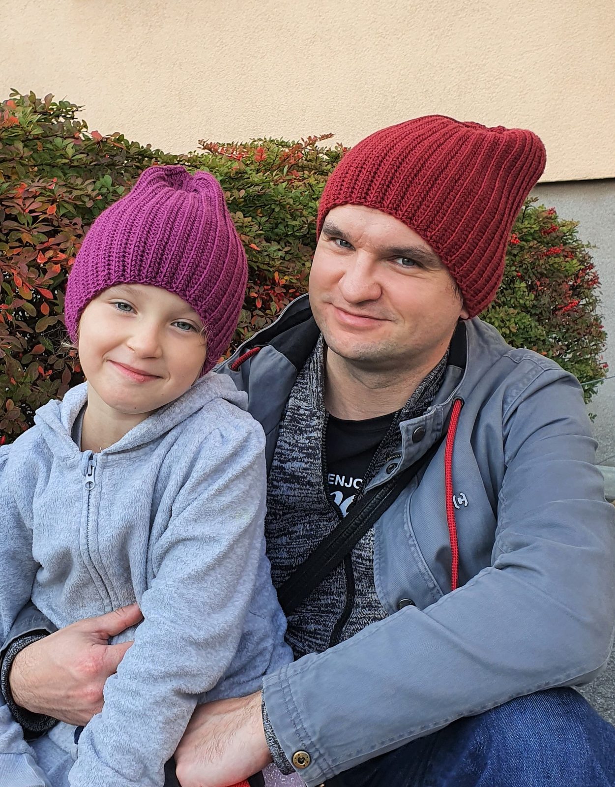 Iceland Beanie crochet hats in matching colors, worn by father and daughter